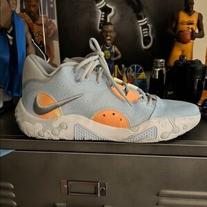 Nike Blue and Orange Sneakers with Low-Top Design